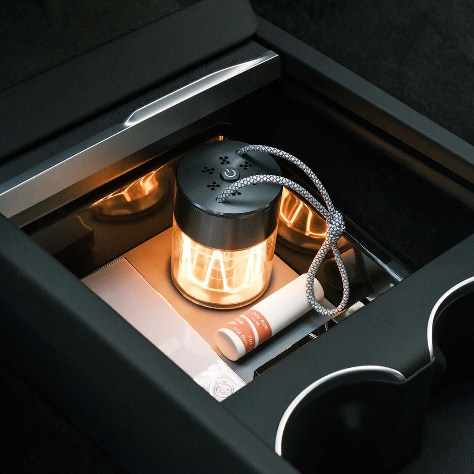 Tesla Model 3 Highland 2024 & Model Y Juniper 2025 Clear Armrest Organizer in action with storage items