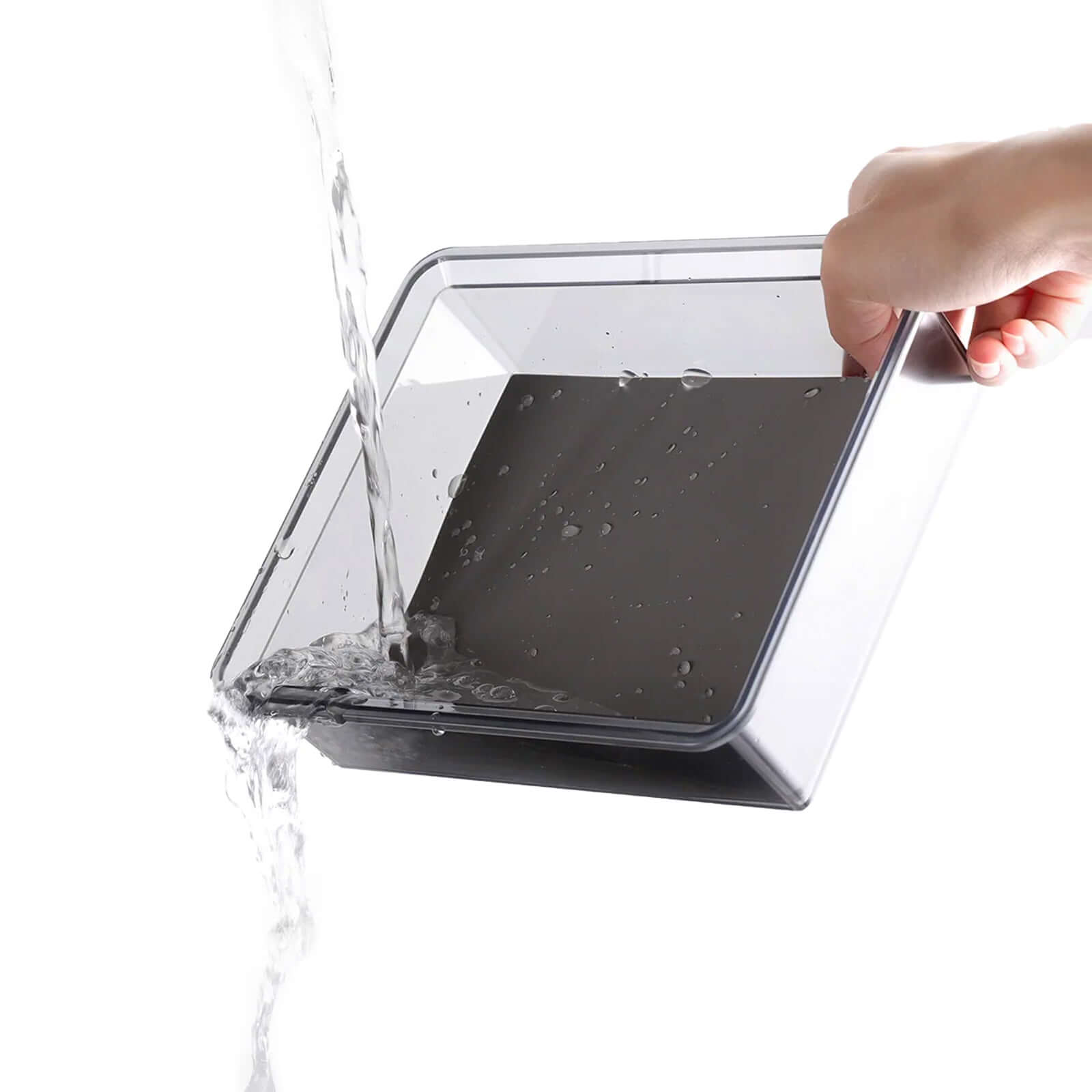 Clear Armrest Organizer water splash demonstration showing scratch resistant material for Tesla Model 3 Highland 2024 & Model Y Juniper 2025