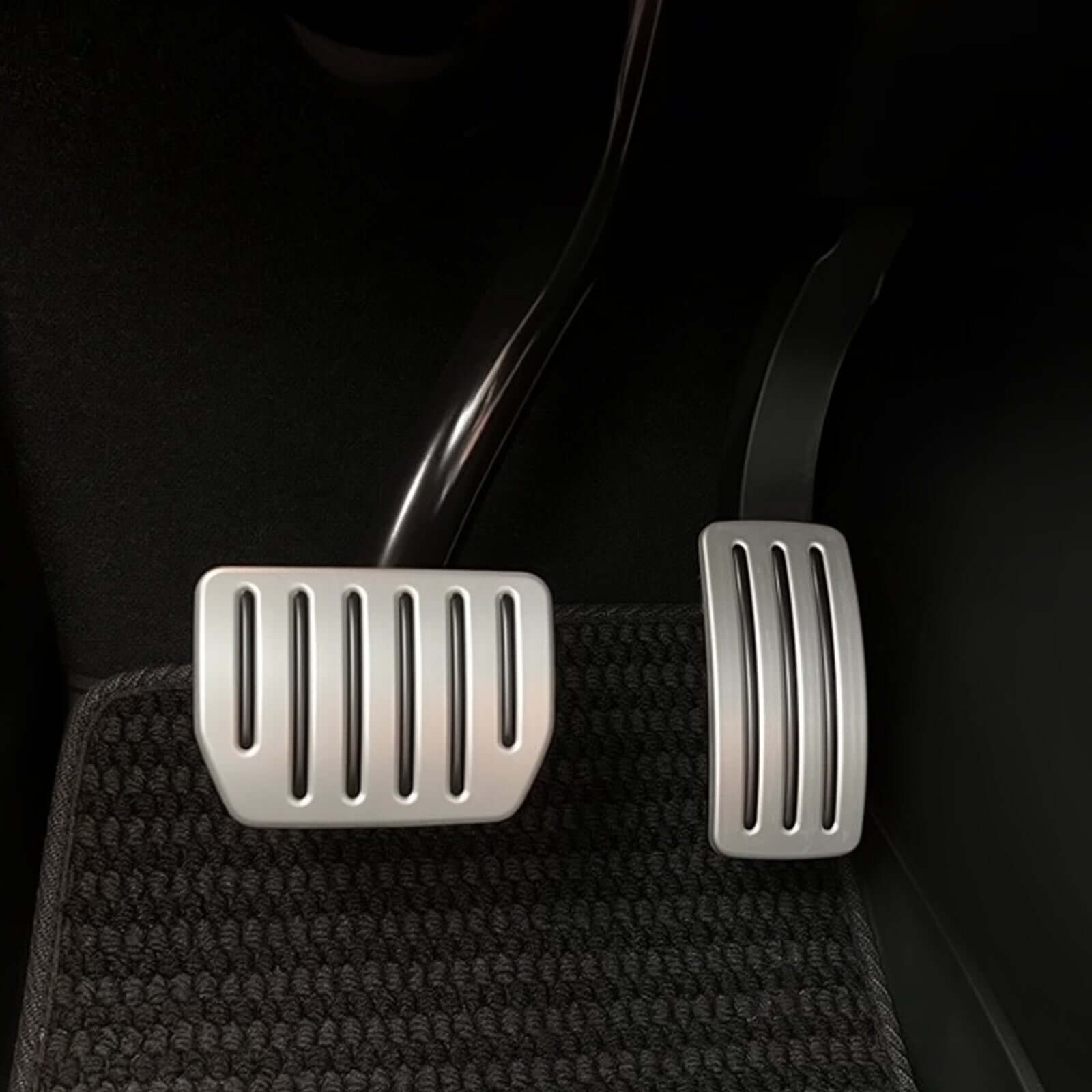Close-up of Aluminum Alloy Non-Slip Textured Accelerator Brake Pedal Covers for Tesla Model 3 showing premium finish and grip