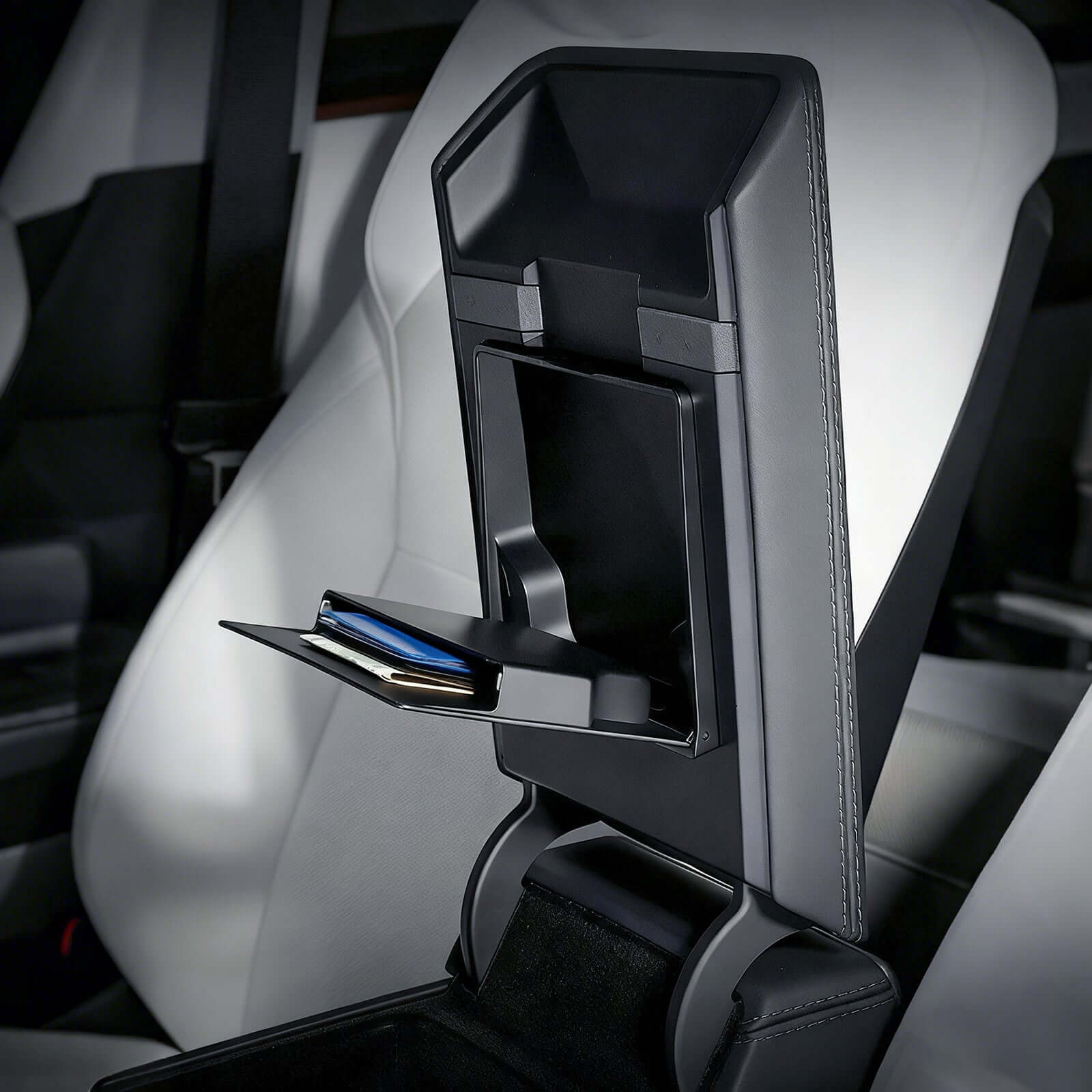 Tesla Model 3 Highland 2024 & Model Y Juniper 2025 Magnetic Armrest Organizer installed showing quick access storage compartment