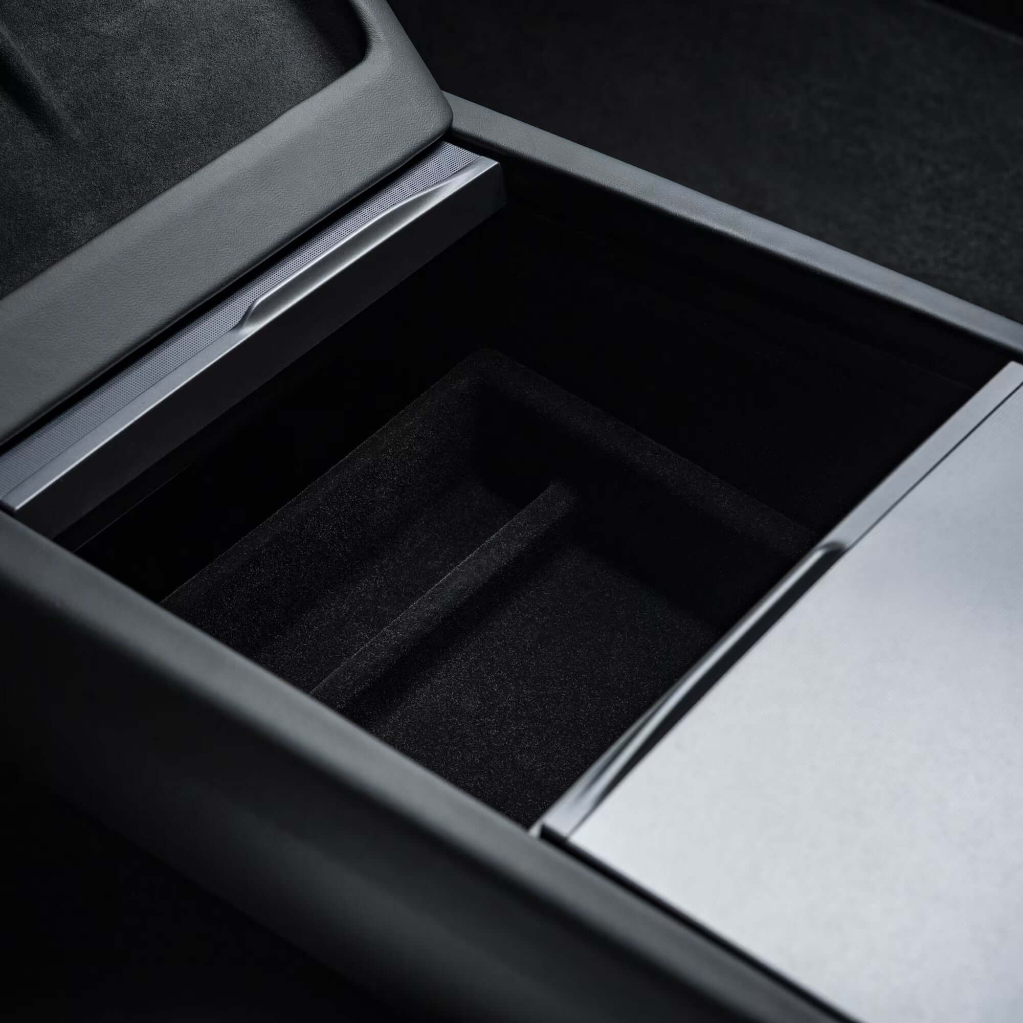 Close-up of interior storage compartment on Tesla Model 3 Highland 2024 & Model Y Juniper 2025 velvet armrest organizer showing non-slip design