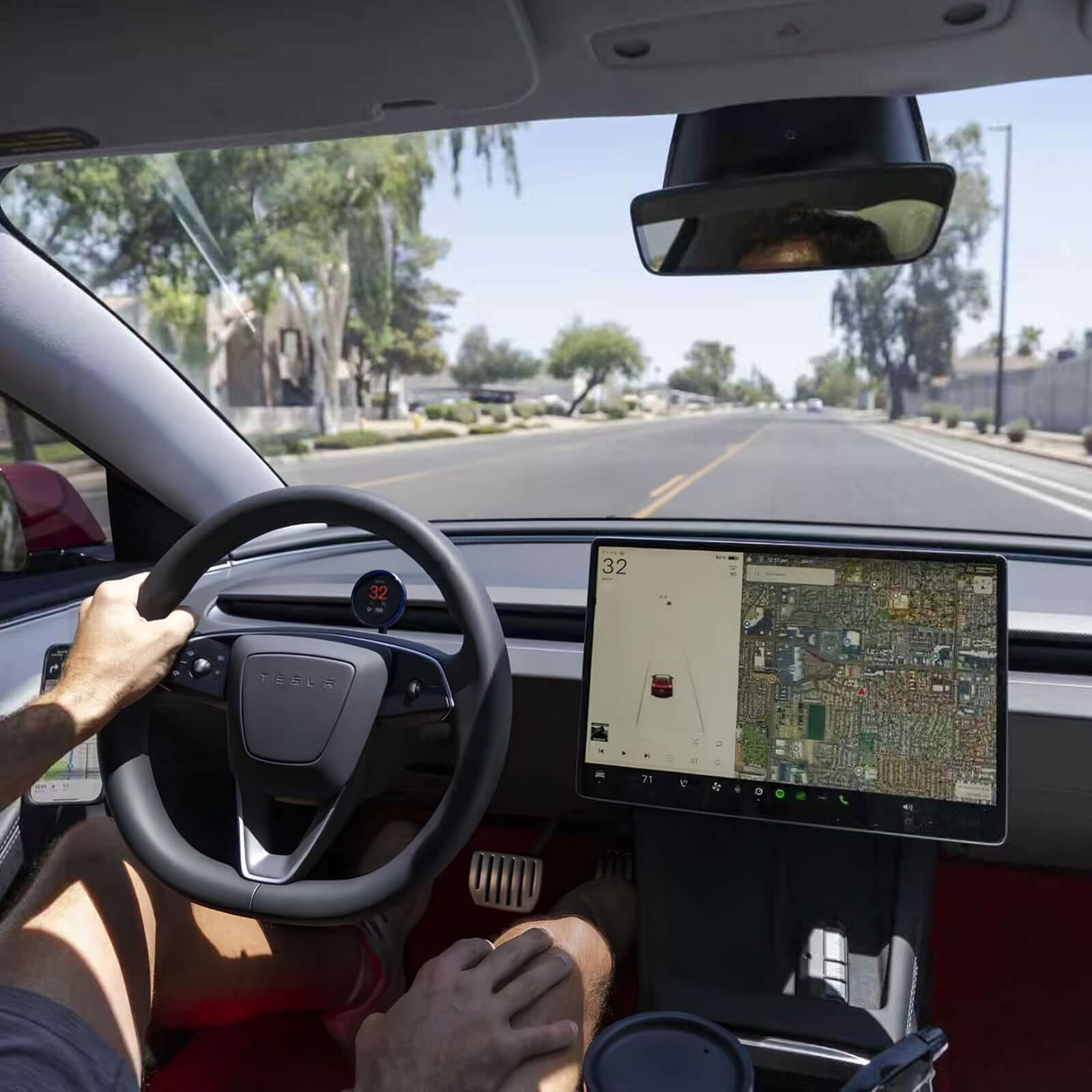 Tesla Model Y Juniper 2025 HUD Display in use showing speed and map on large screen