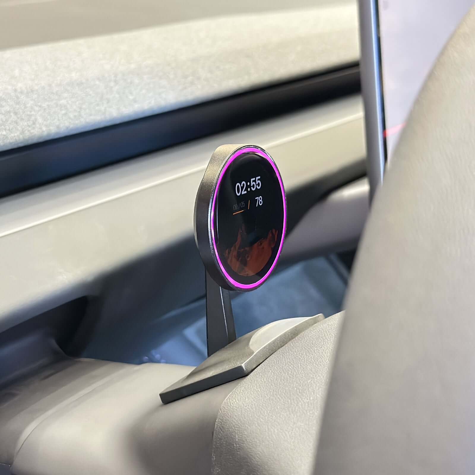 Close-up of Tesla Model Y Juniper 2025 HUD Display showing time and temperature indicators in stylish design