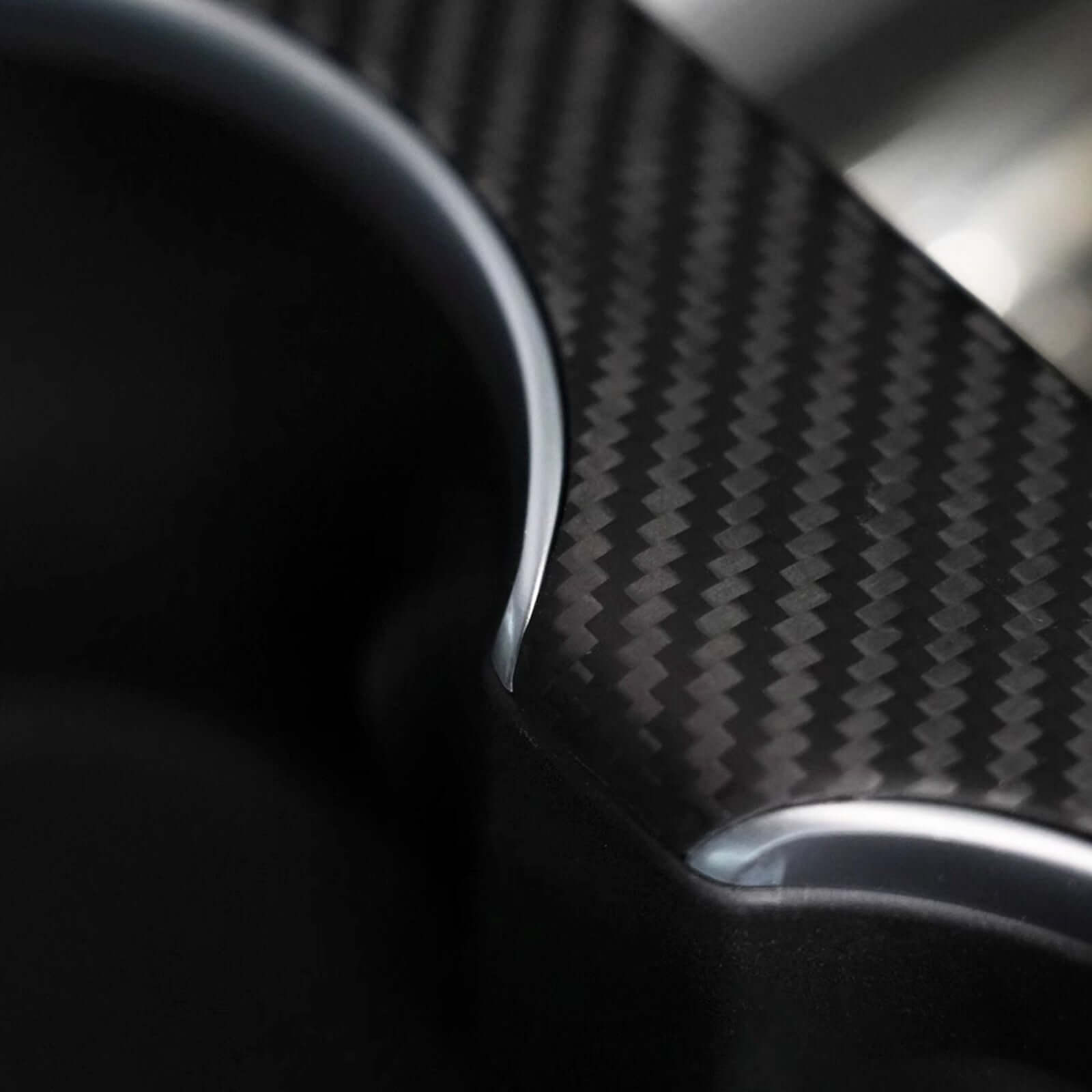 Close-up of real carbon fiber texture on Real Carbon Fiber Center Console Cover for Tesla Model 3 Highland 2024 & Model Y Juniper 2025