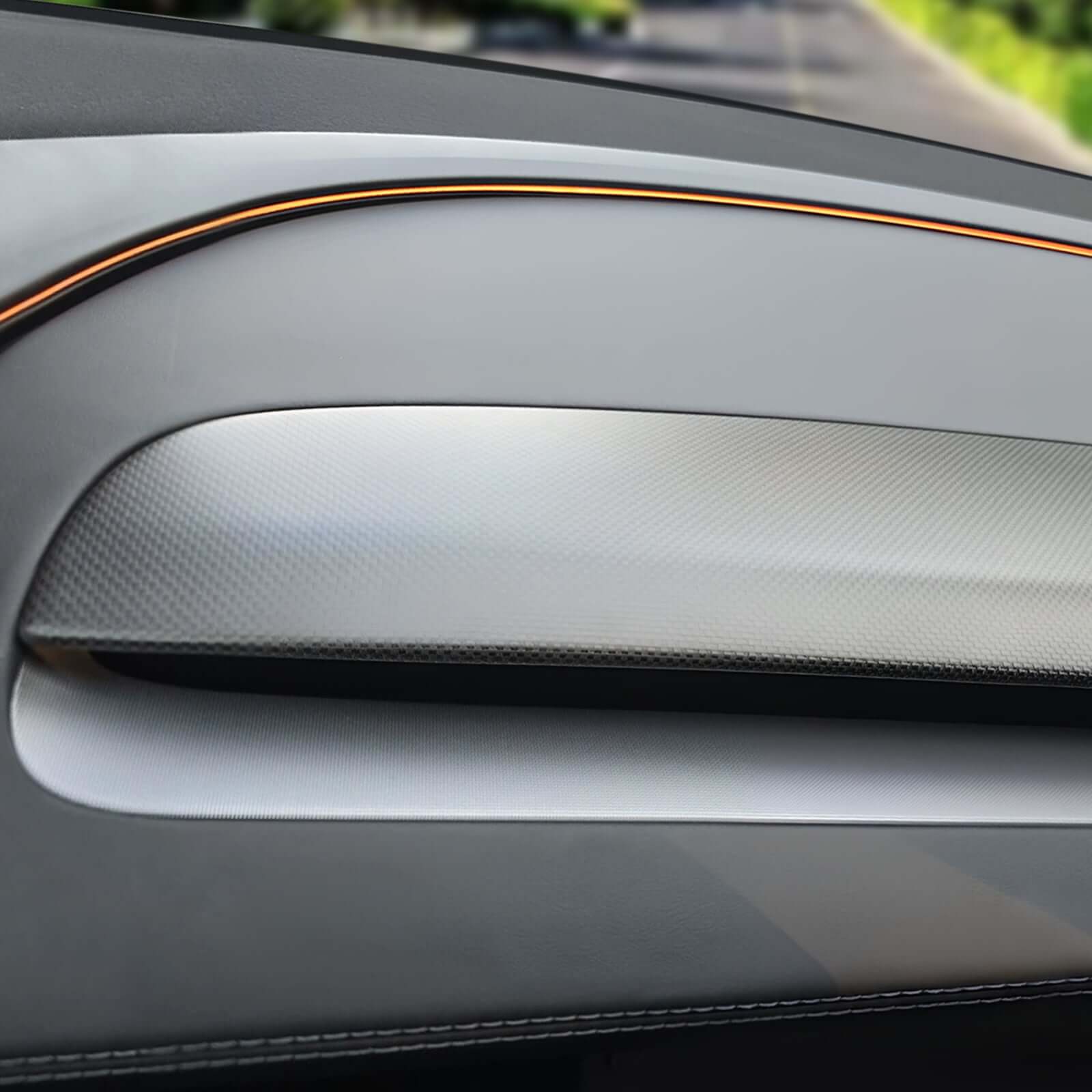 Close-up of Real Dry Carbon Fiber panel on Tesla Model 3 Highland & Model Y Juniper 2025 dashboard showing premium texture