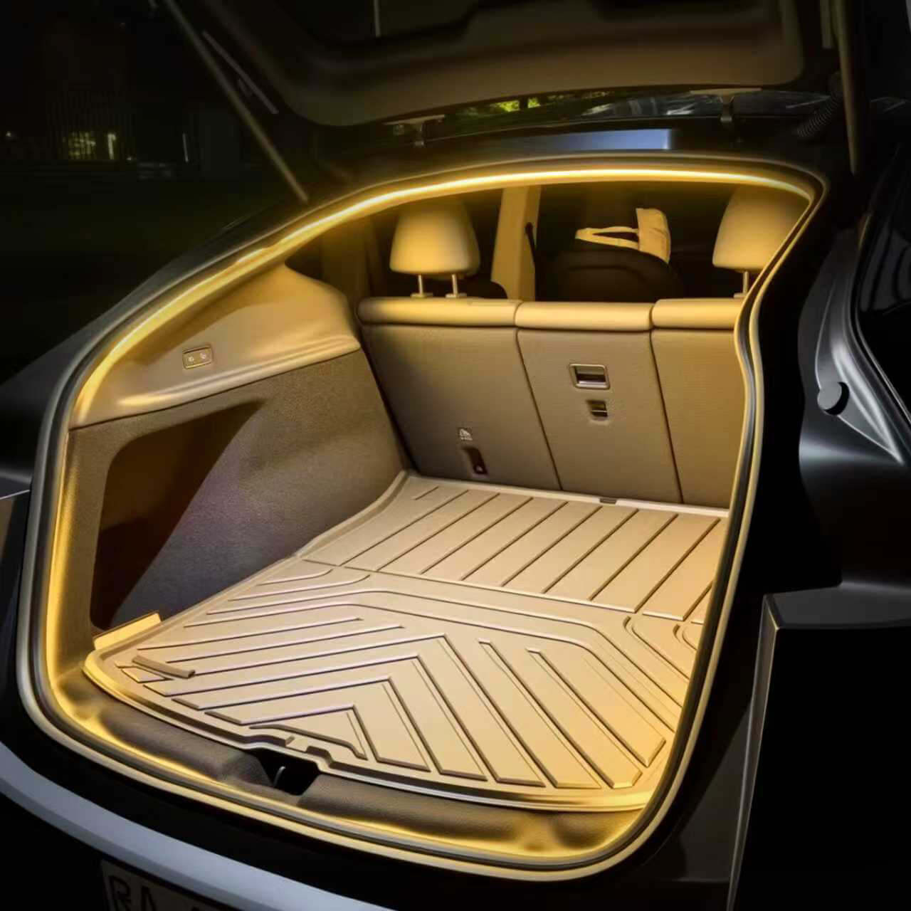 Tesla Model Y interior with Y Juniper Trunk Light Pro activated in ambient lighting