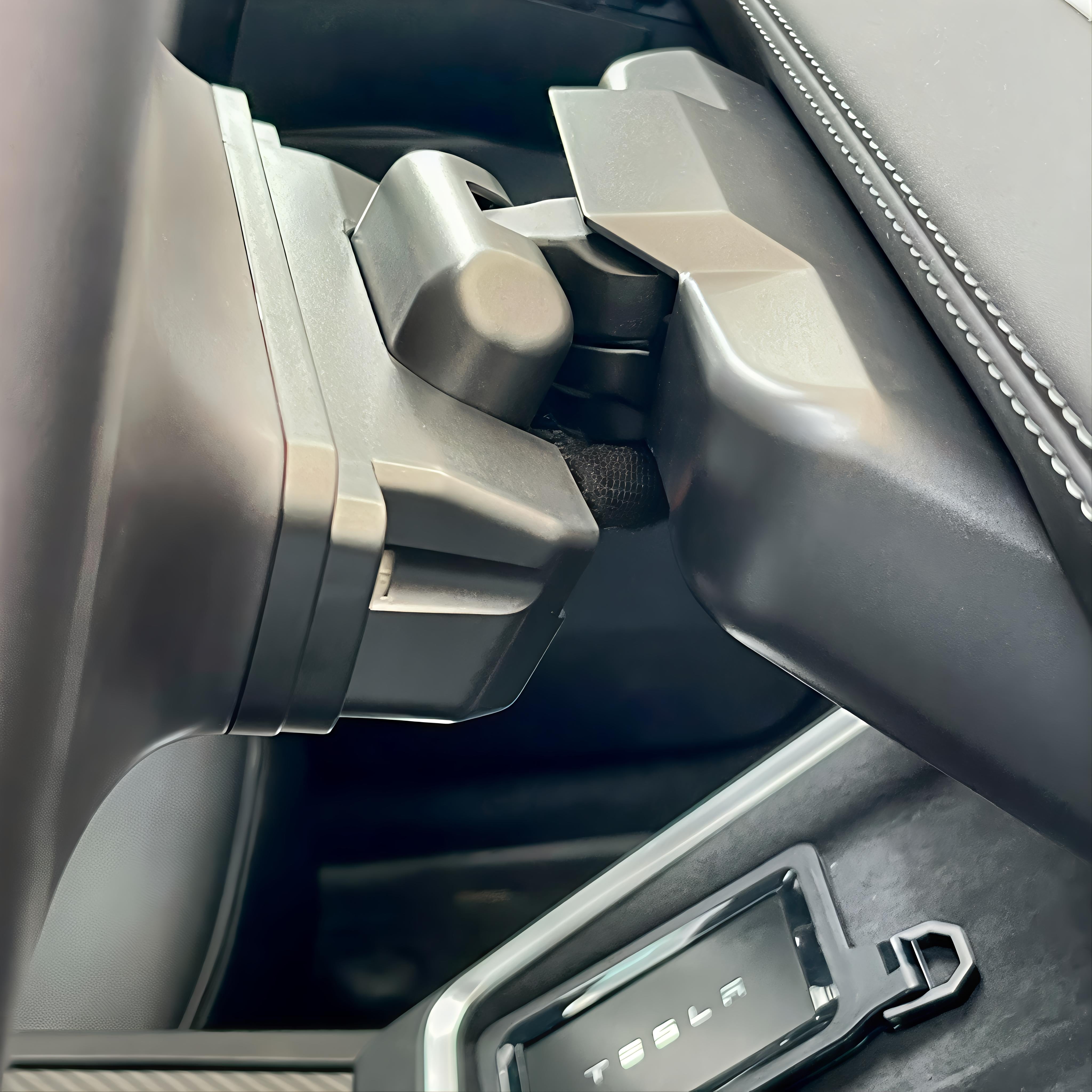 Close-up of the Adjustable Rotating Screen Mount Kit for Tesla Model 3/Y installed in the vehicle's interior.