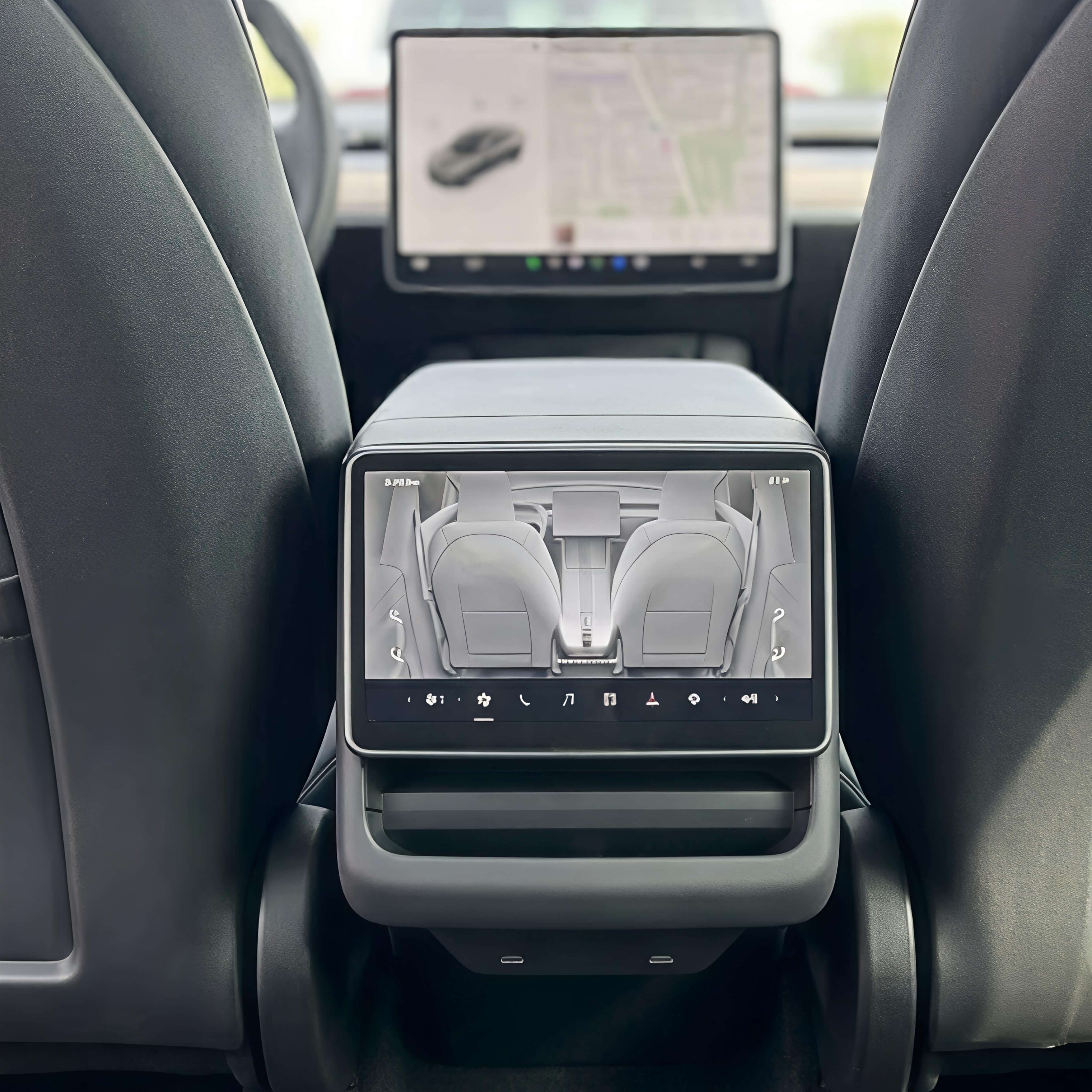 Rear display of Tesla Model 3/Y with tempered glass screen protector, highlighting full coverage and seamless fit.