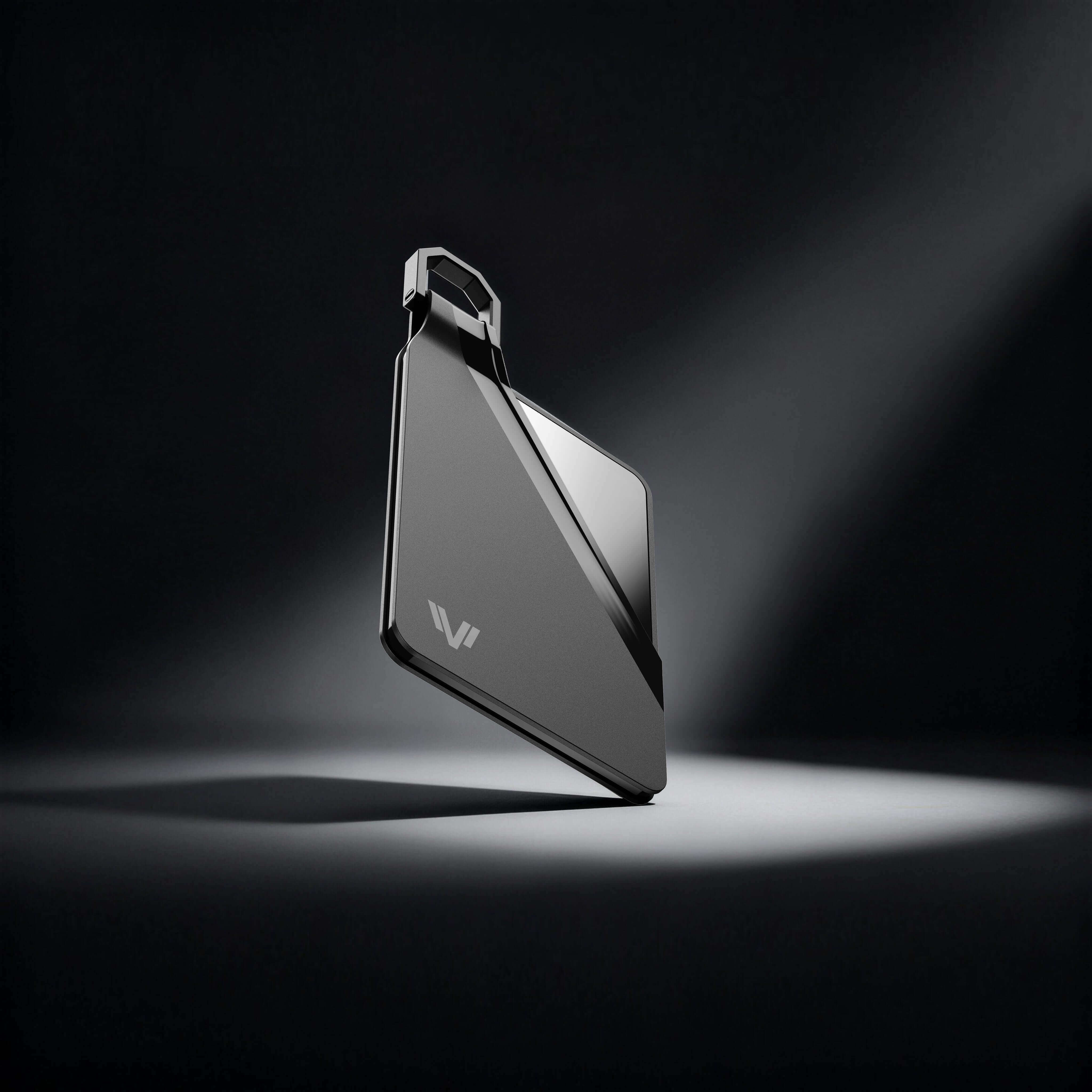 Close-up of Tesla Key Card Holder - Magnetic Snap Cover & Reinforced Backplate in sleek black finish.