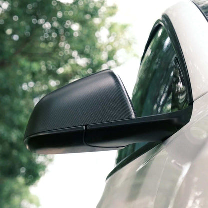 Side view of Real Dry Carbon Fiber Mirror Covers for Tesla Model 3 Highland 2024 showing aggressive style and OEM fit