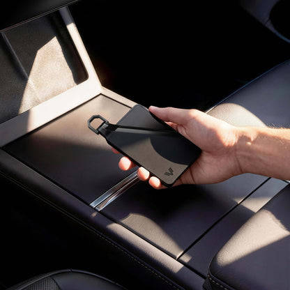 Tesla Model 3 key card holder in use on center console showing magnetic snap cover