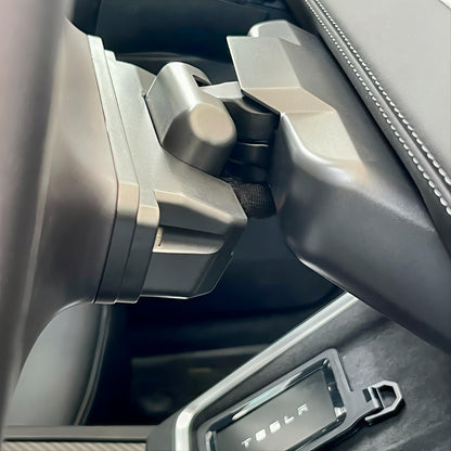 Close-up of the Adjustable Rotating Screen Mount Kit for Tesla Model 3/Y installed in the vehicle's interior.