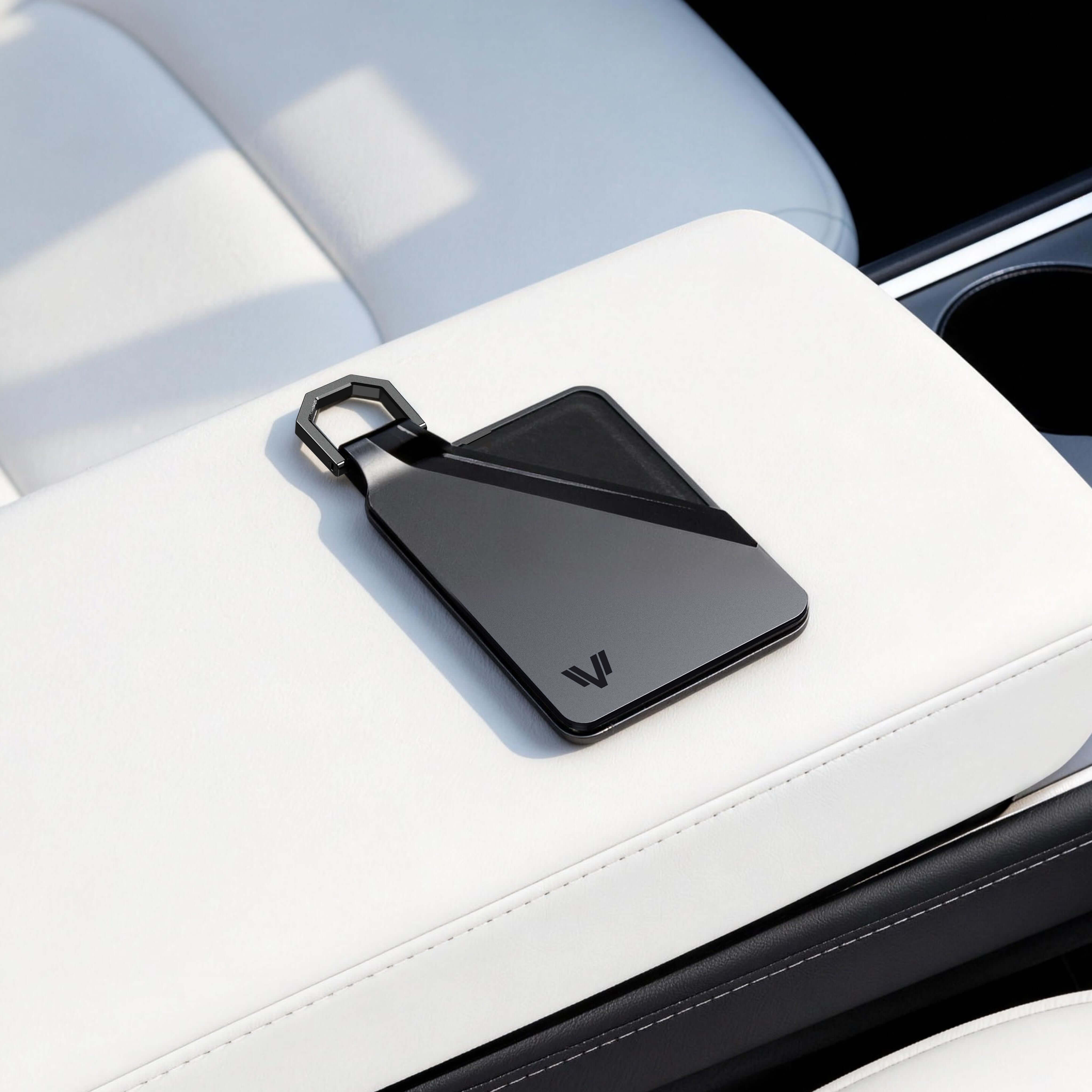 Tesla Model Y Key Card Holder - Magnetic Snap Cover & Reinforced Backplate in sleek black on white console